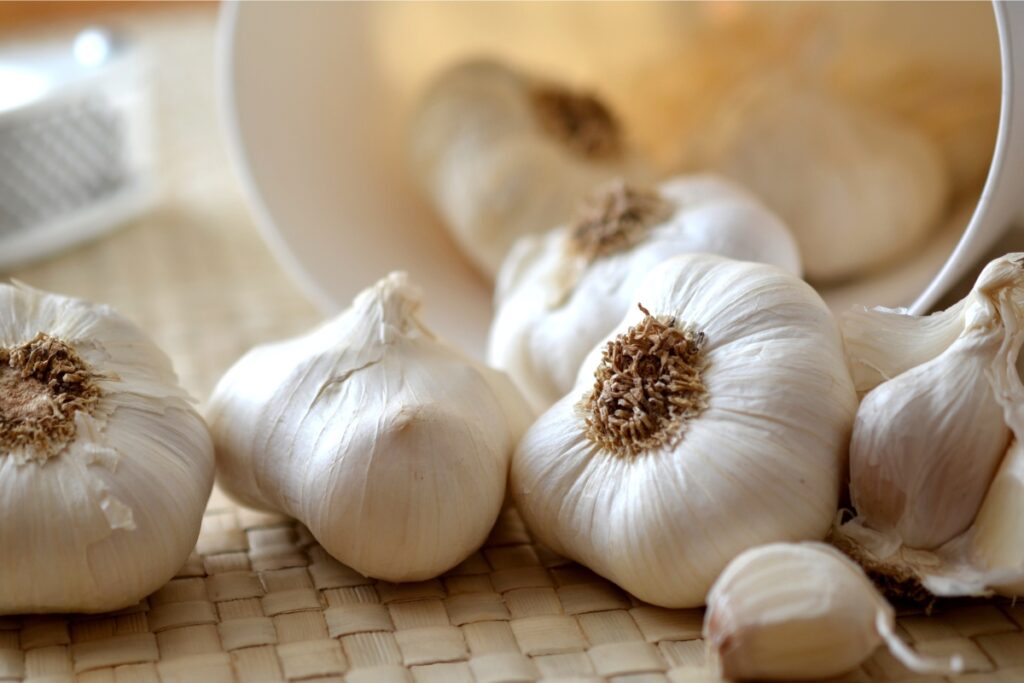 Adding Garlic to Rice Containers
