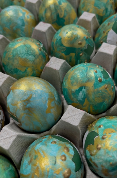 a box field with colored eggs